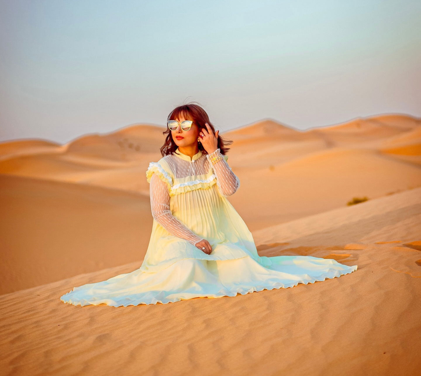 Hina Khan dazzles in an off-white gown that harmonizes with the desert backdrop