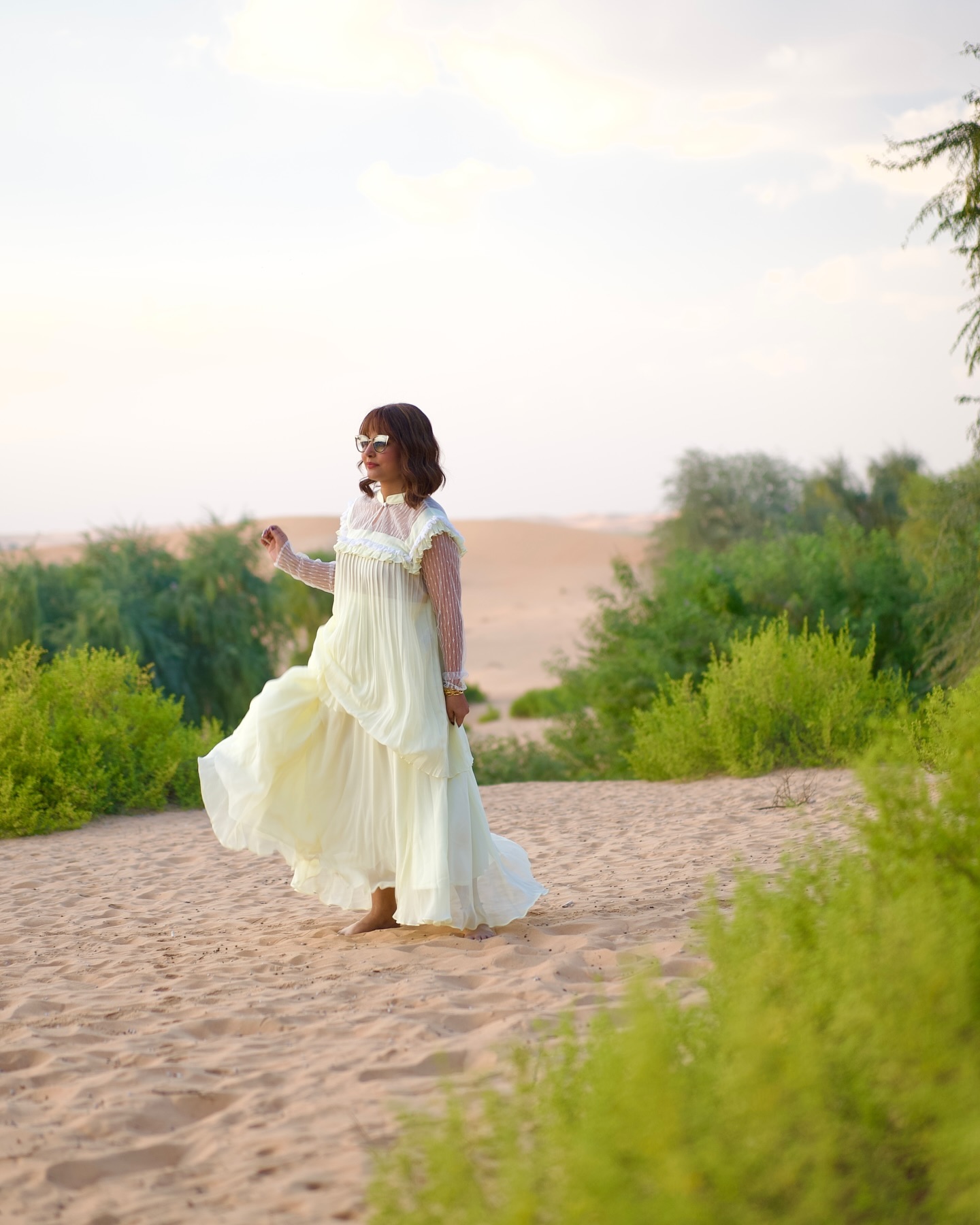 Hina Khan dazzles in an off-white gown that harmonizes with the desert backdrop