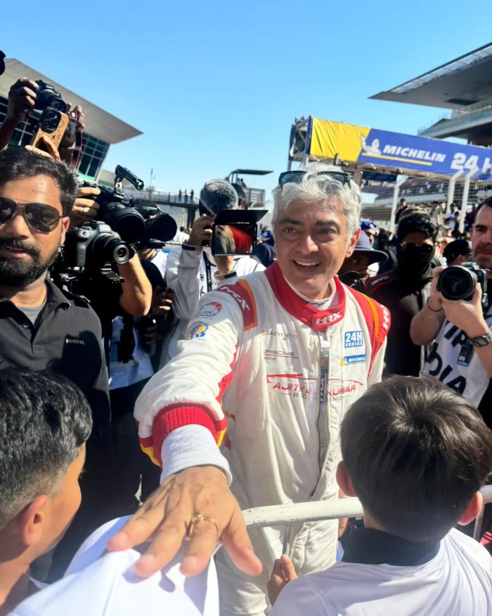 In Pics: Ajith Kumar kisses Wife Shalini After Winning The Race At Dubai 24H Event