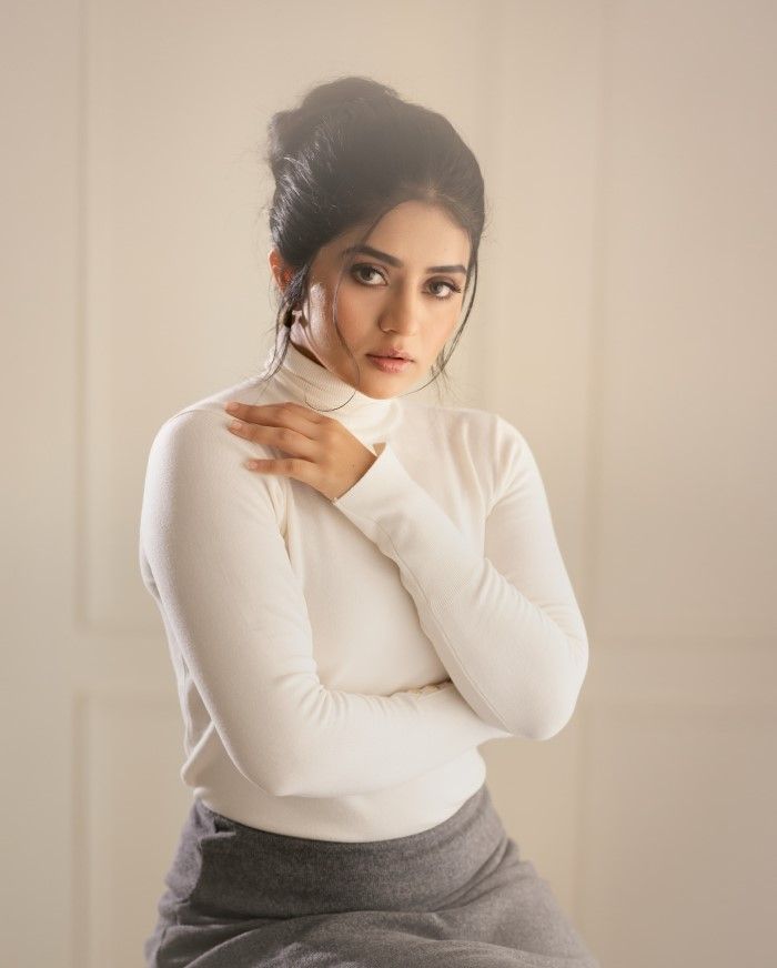 Megha shetty stuns fans in elegant white outfit in latest photoshoot
