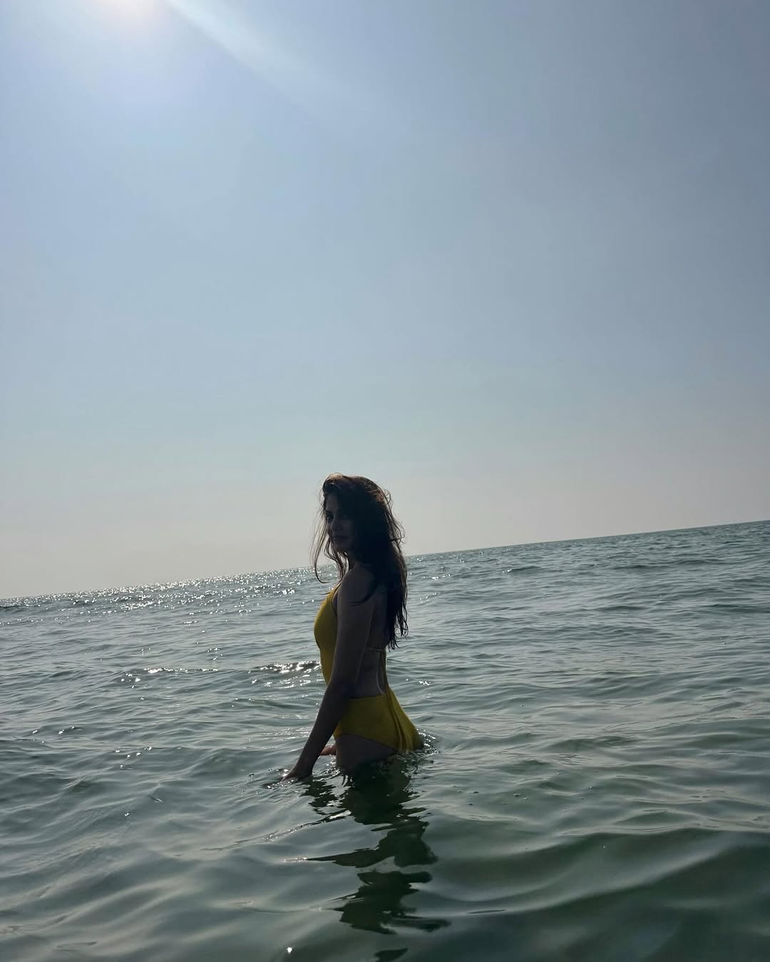 Rhea Chakraborty Sizzles In Yellow Outfit During Beach Vacation