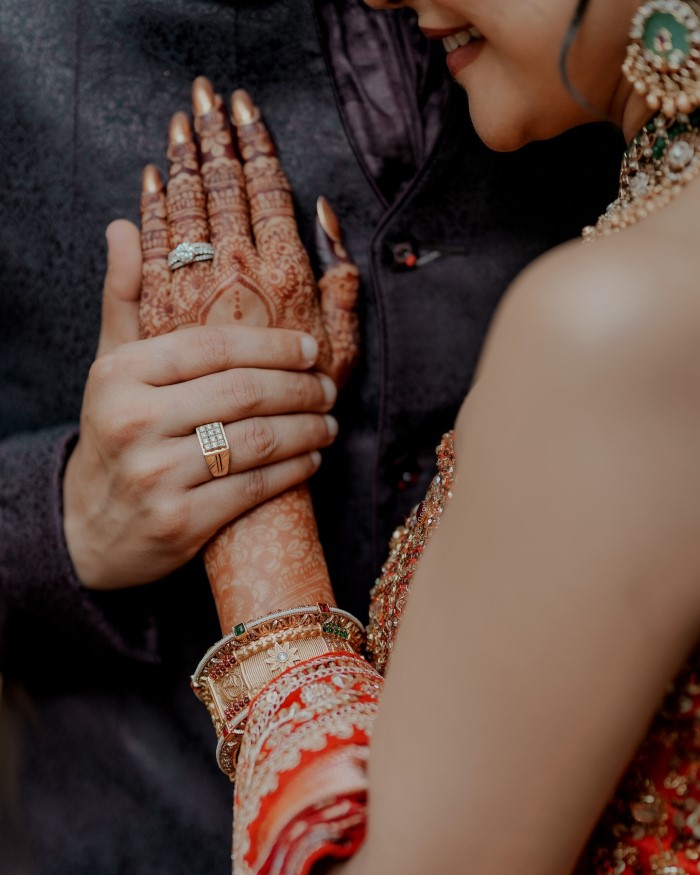The couple showcases a mix of playful and romantic poses, reflecting their love and bond.