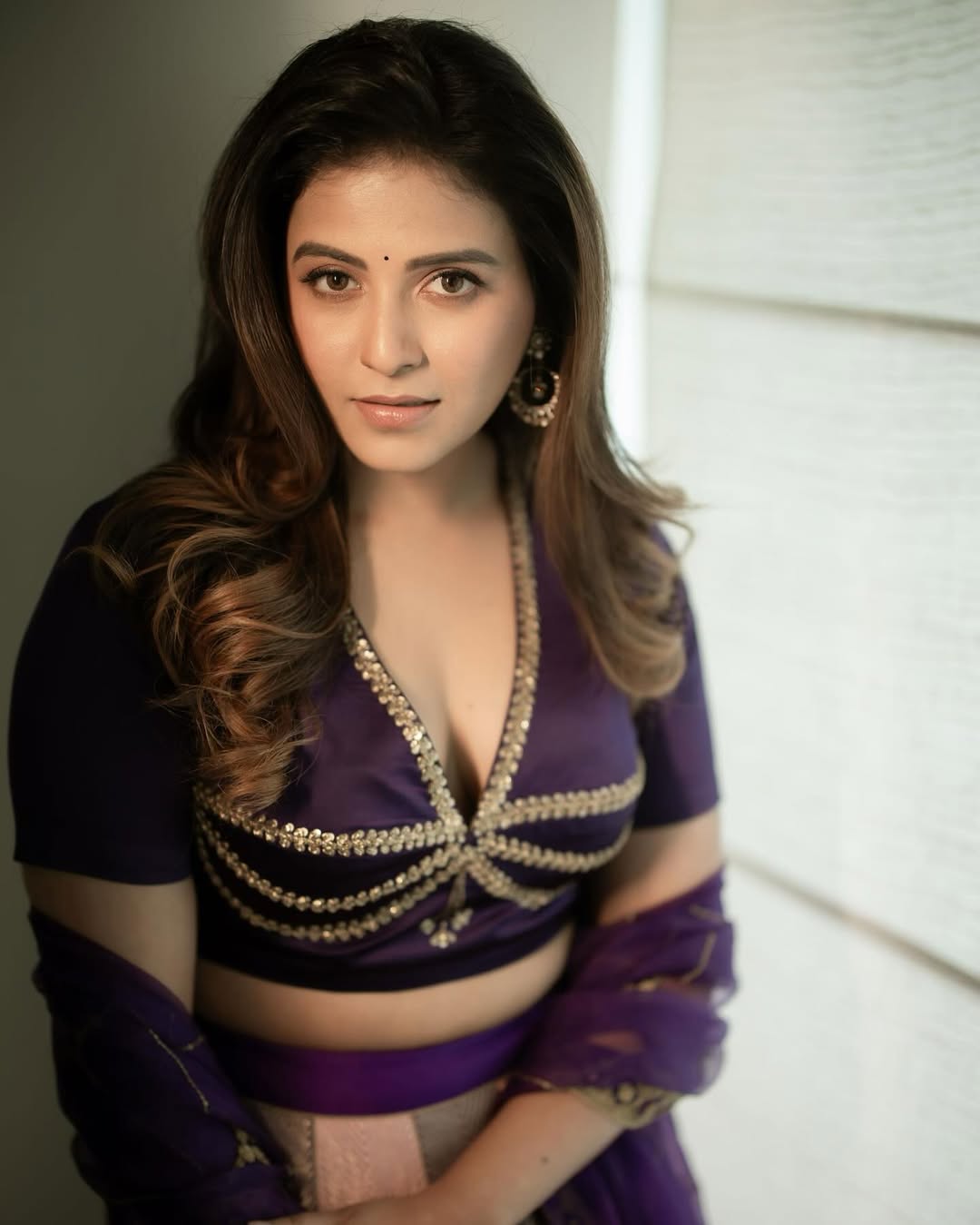 Anjali Looks Stunning In Purple color Lehenga