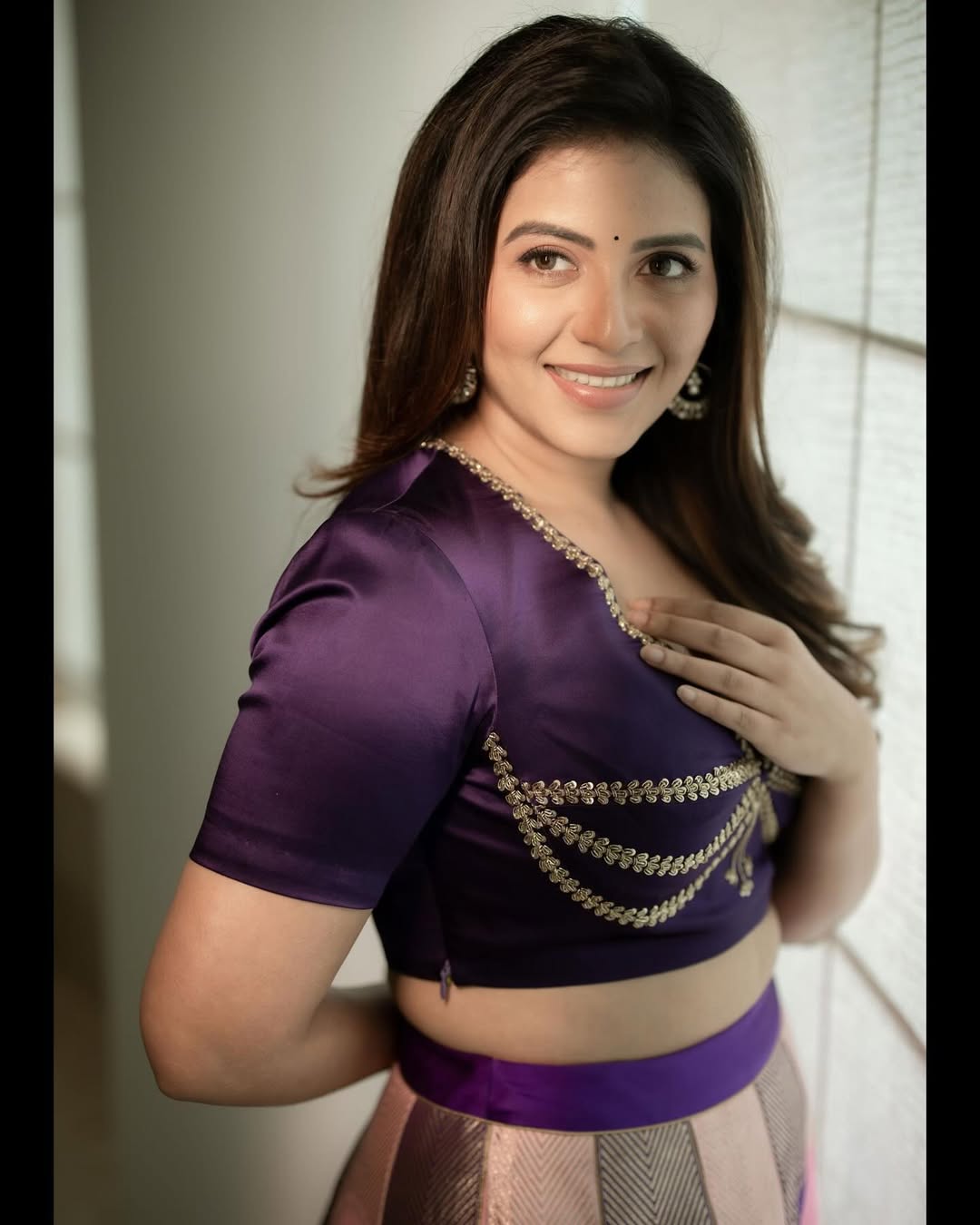Anjali Looks Stunning In Purple color Lehenga