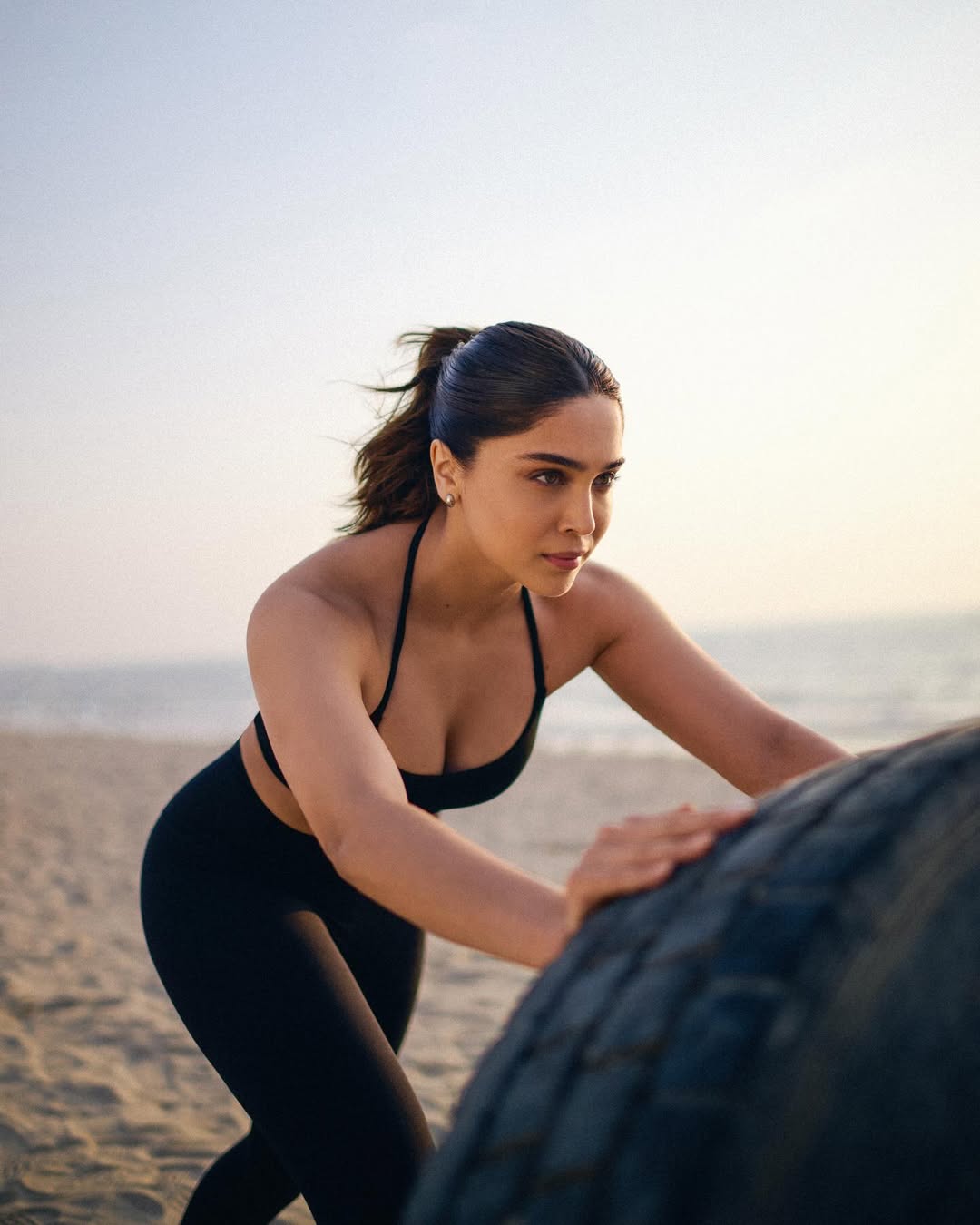 Actress Sharvari's Beach Workout is On Point with Tyre Training in Black Outfit