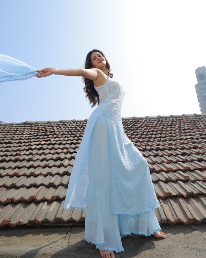 Amyra Dastur Wows In Elegant Blue Dress During Rooftop Photoshoot