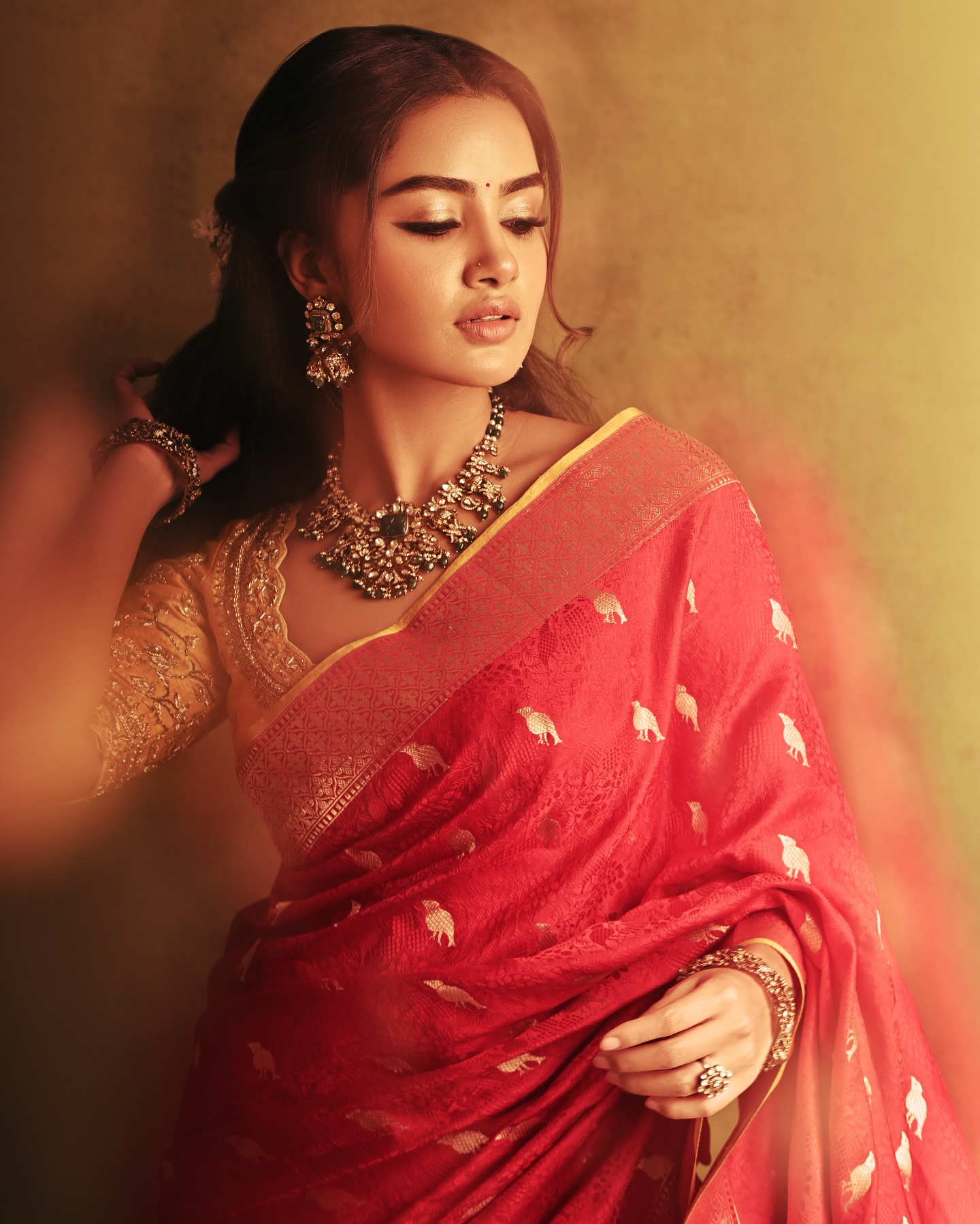 Anupama Parameswaran Stuns In Traditional Red Saree