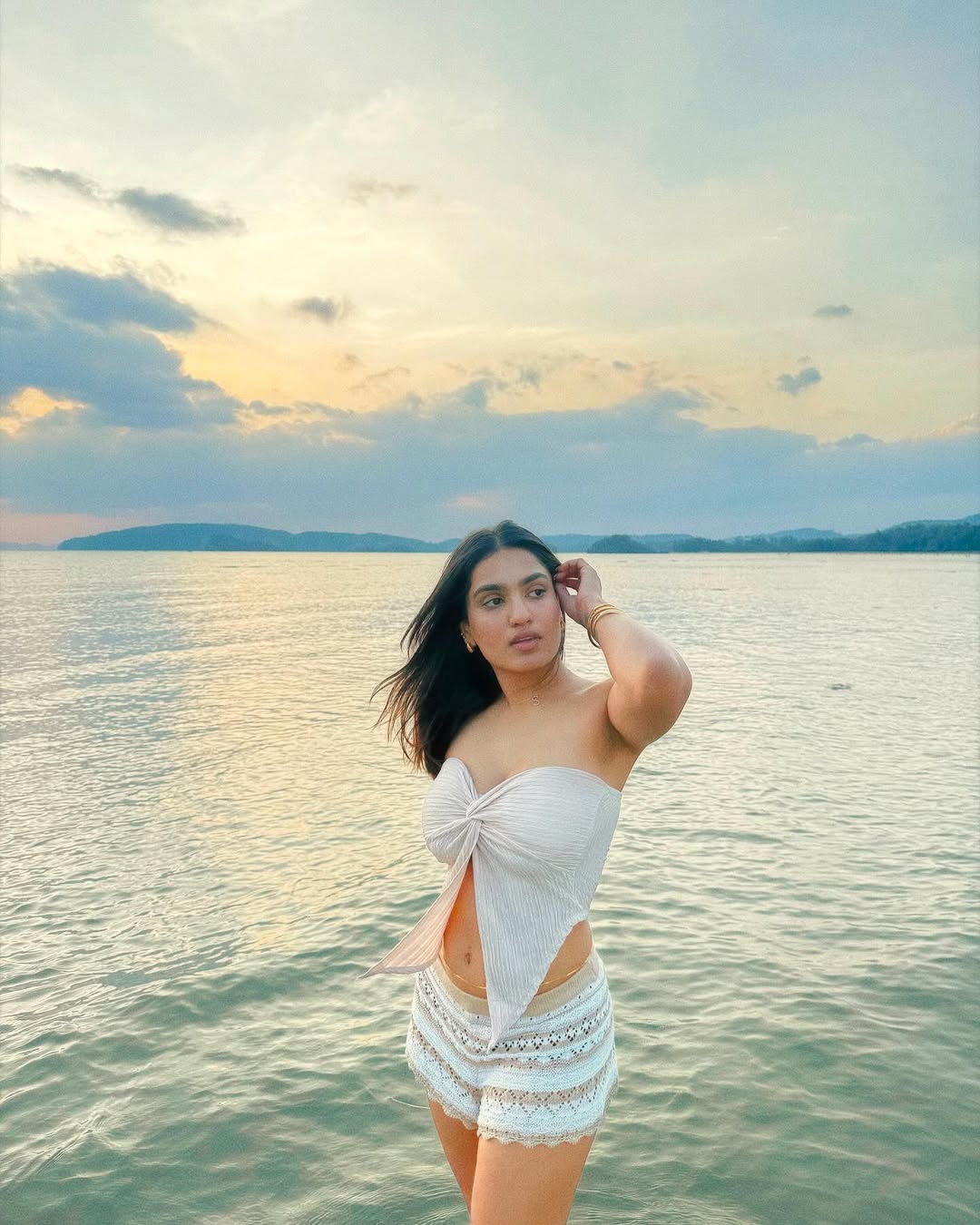 Saniya Iyappan's Elegant Photoshoot in White Outfit at Krabi, Thailand