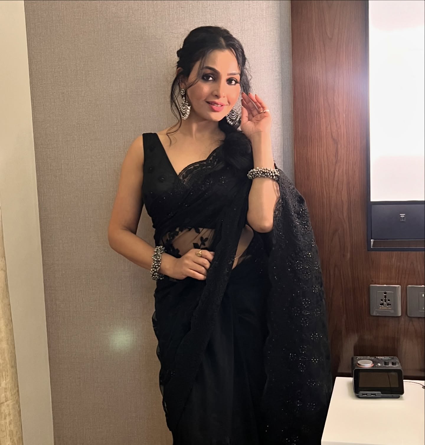 A black saree never fails to impress, and Shubhangi Atre proves it perfectly. In this stunning black sheer saree, she looks glamorous and stylish.