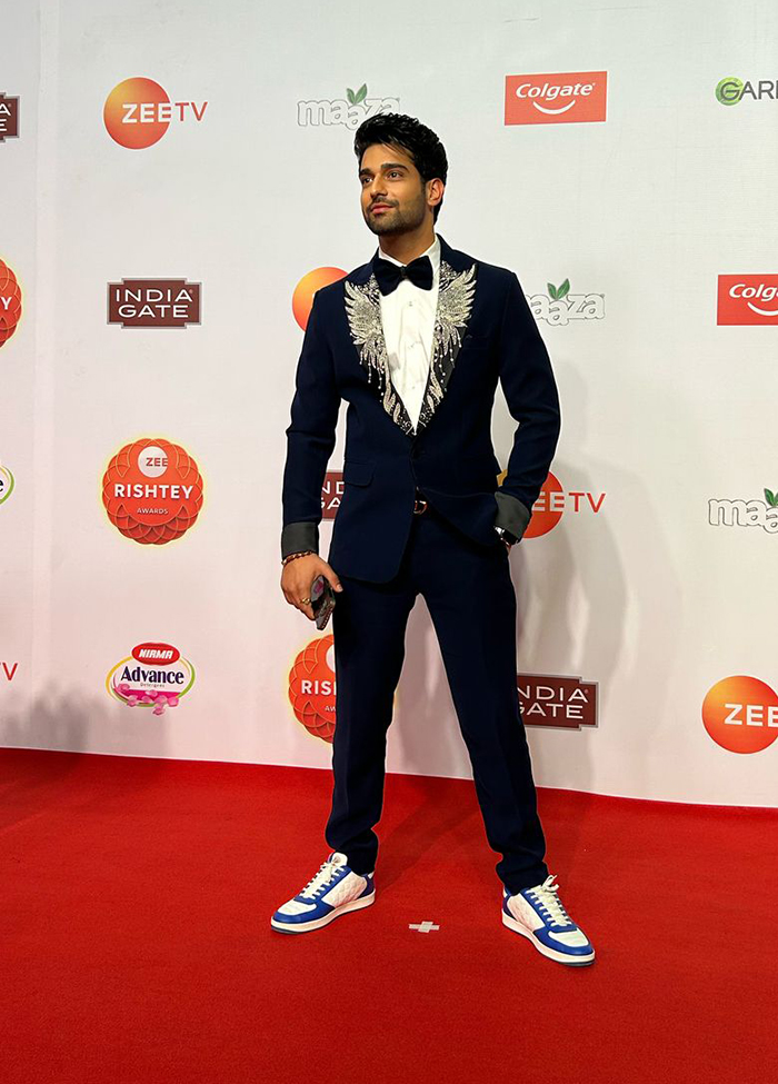 Abhishek Malik aka Neel Paranjape looking dapper in black and white suit at the red carpet of Zee Rishtey Awards 2025