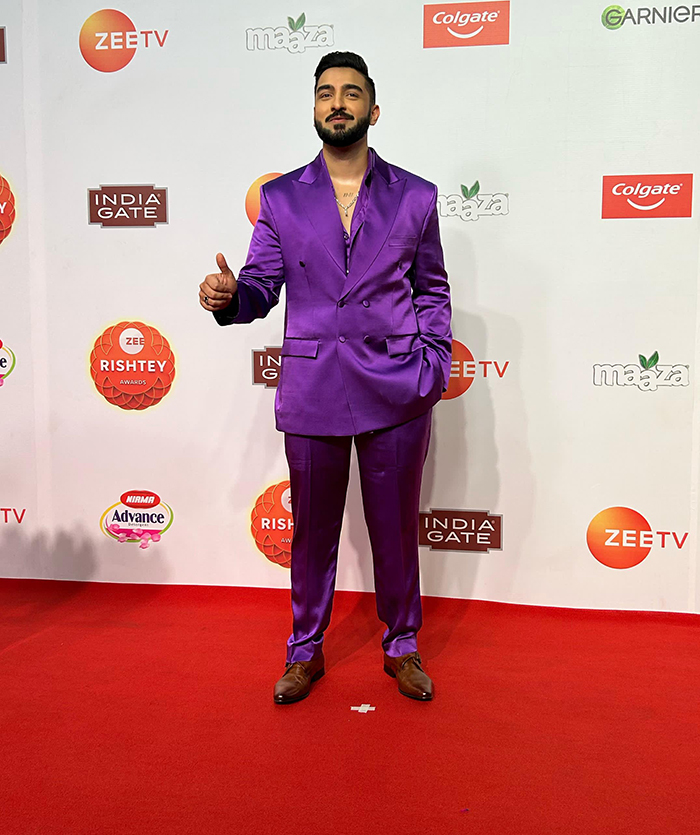 Rohit Suchanti aka Rishi looking dapper in purple at the red carpet of Zee Rishtey Awards 2025