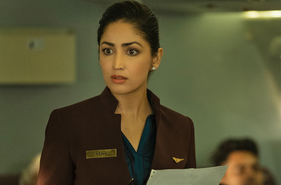 In Chor Nikal Ke Bhaga, Yami Gautam nailed the flight attendant look with a crisp uniform, sleek hair, and confident demeanor.