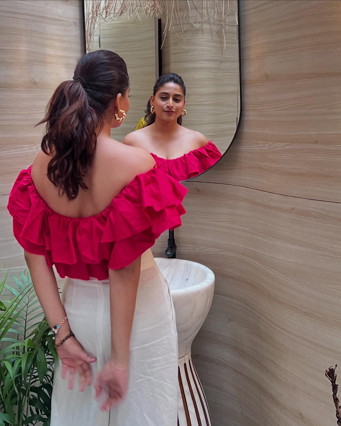 Nishvika Naidu’s Stunning Bold Red Look With White Elegance Latest Photoshoot