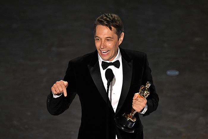 US producer Sean Baker accepts the award for Best Film Editing for Anora onstage during the 97th Annual Academy Awards at the Dolby Theatre in Hollywood, California on March 2, 2025.