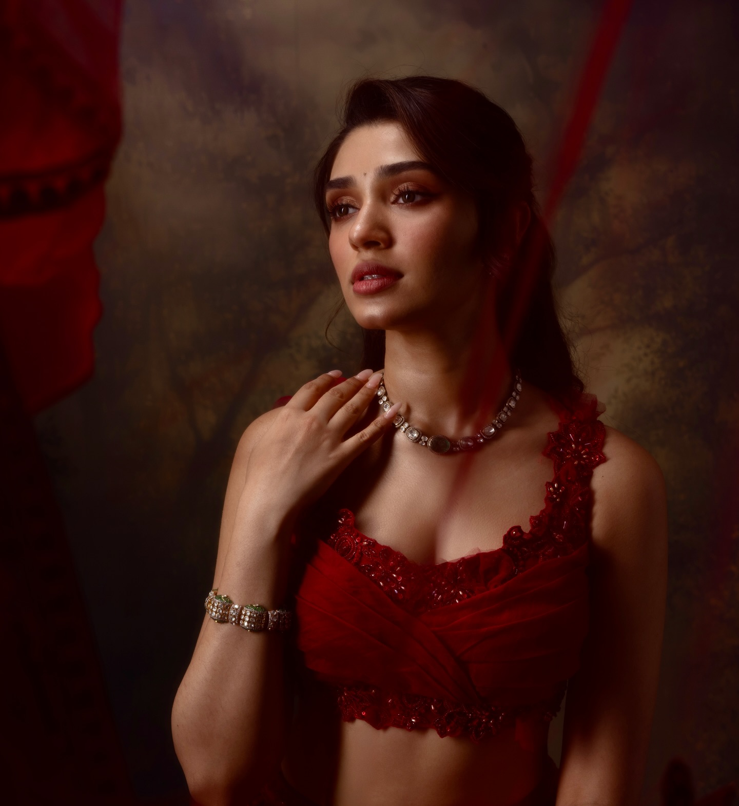 Uppena Beauty Krithi Shetty Dazzles in Dreamy red Lehenga