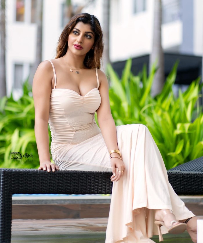 Yashika Aannand Shines In White Bodycon Dress Photoshoot