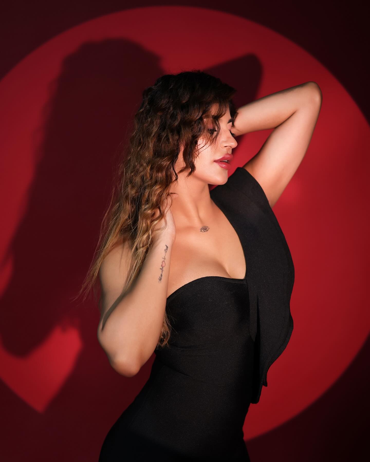 Yashika Aannand stuns in a stylish black dress.