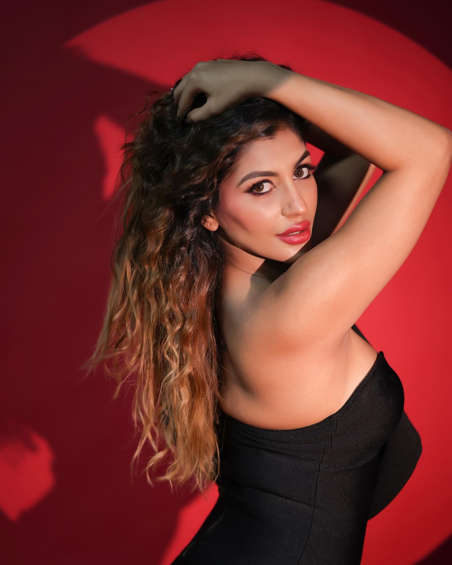 Yashika Aannand stuns in a stylish black dress.