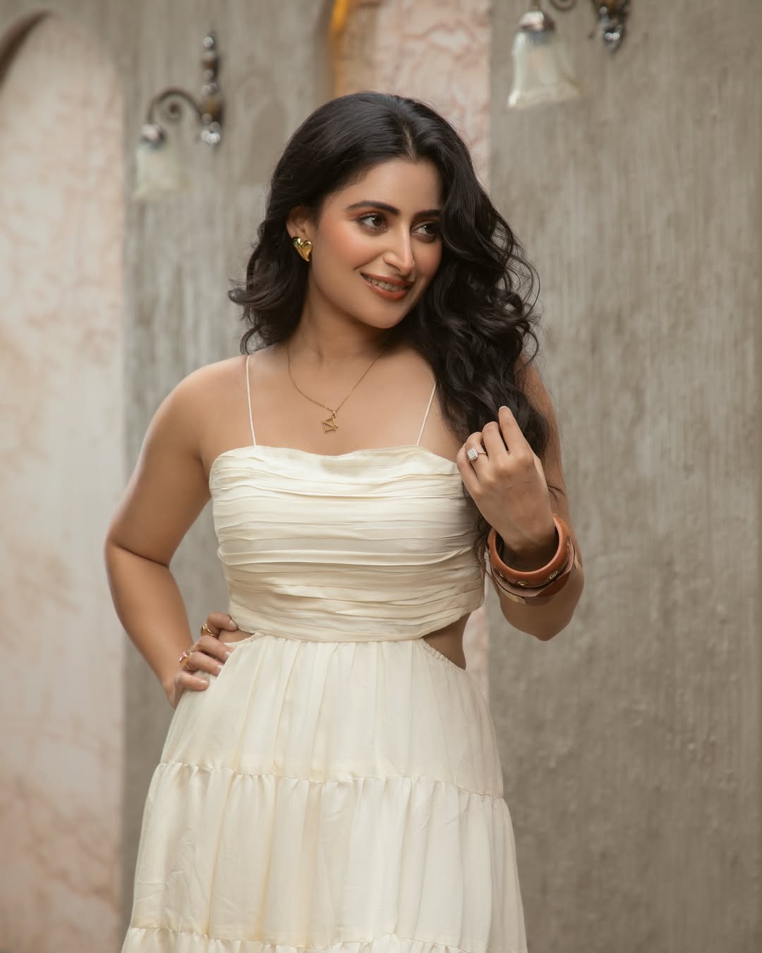 Aishwarya Sharma radiates charm and composure in a timeless cream outfit