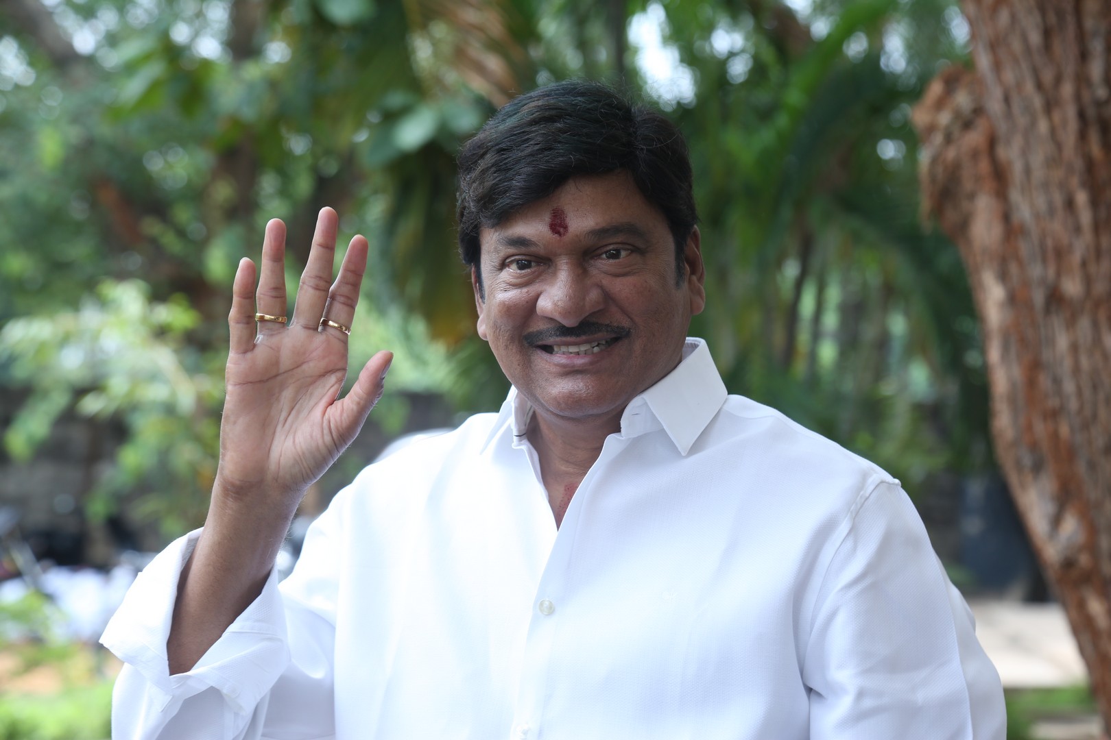 Rajendra Prasad radiates charm and warmth, capturing the essence of a beloved actor