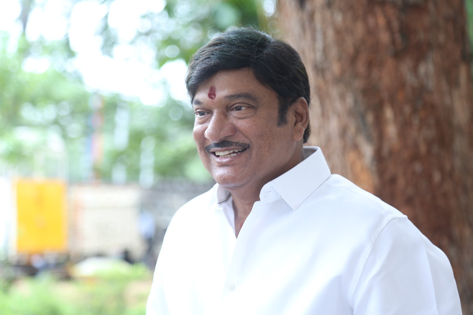 Rajendra Prasad's joyful smile reflects his warm and charismatic personality