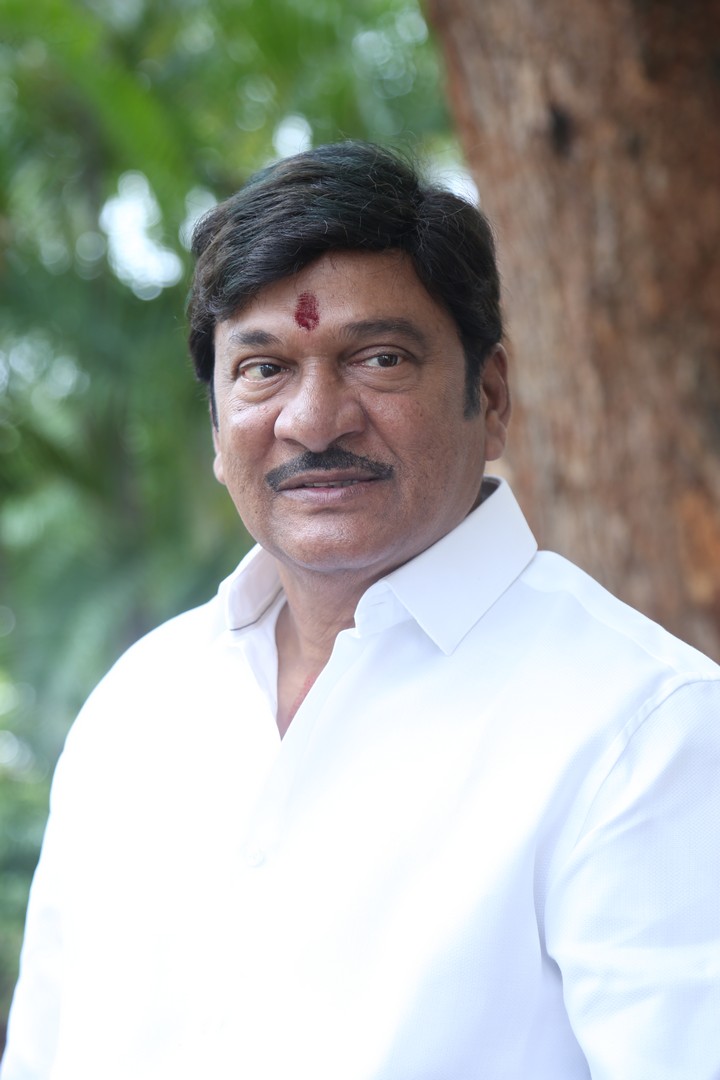 Rajendra Prasad exudes a calm and confident presence amidst nature's backdrop