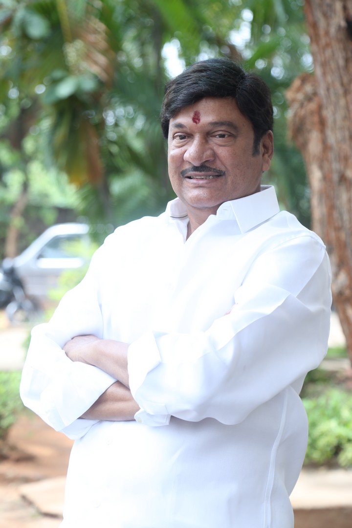 Rajendra Prasad's confident stance amidst nature's serenity reflects his grounded and charismatic personality