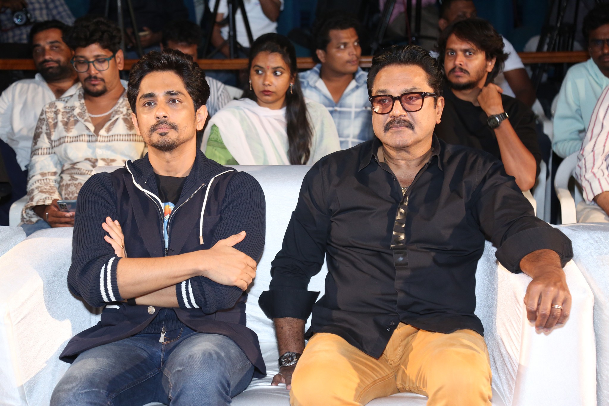 Actor Siddharth and R. Sarathkumar were seen seated together, sharing a friendly moment at the press meet