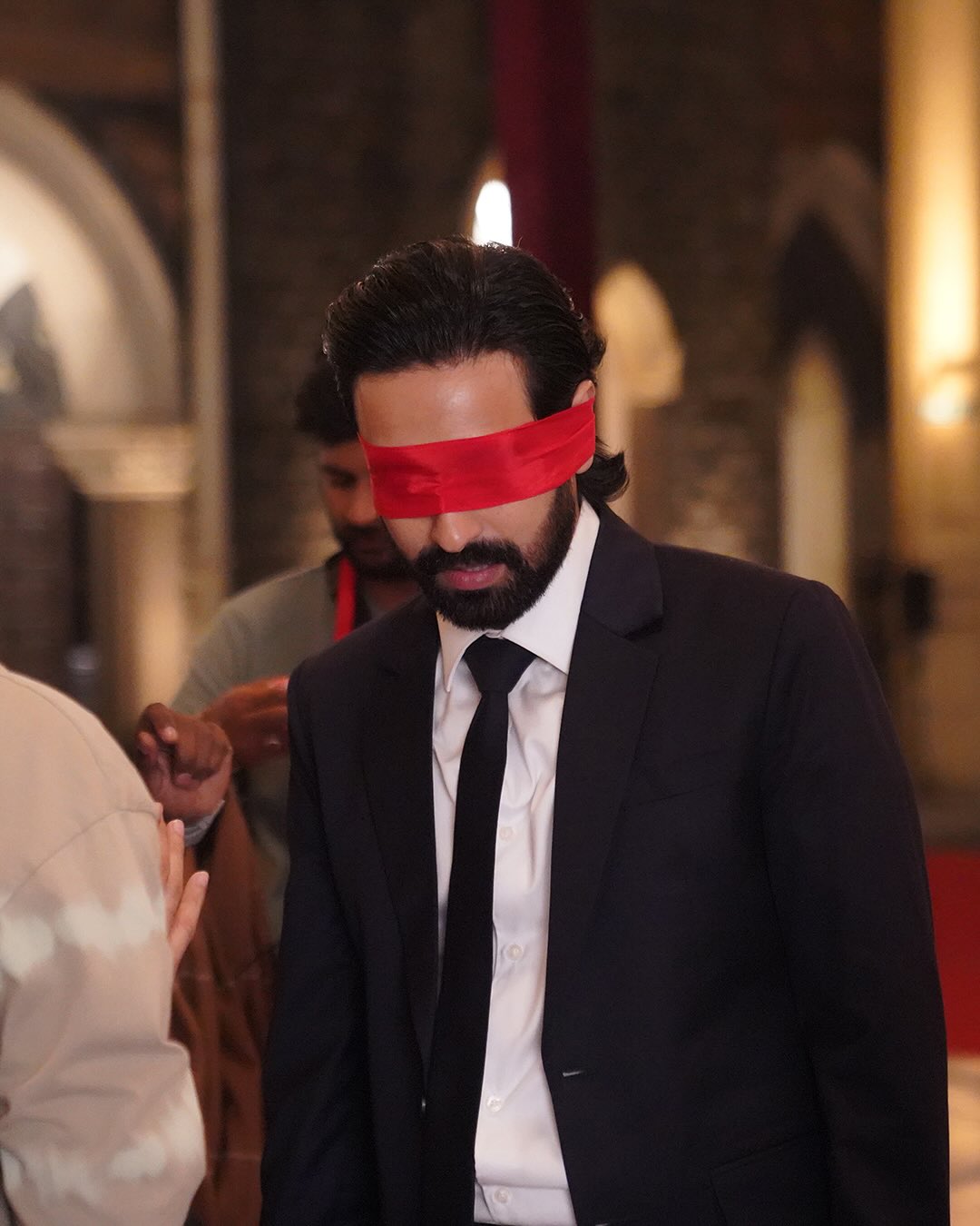 A powerful visual from the film showing Vikrant Massey blindfolded, conveying depth and vulnerability.