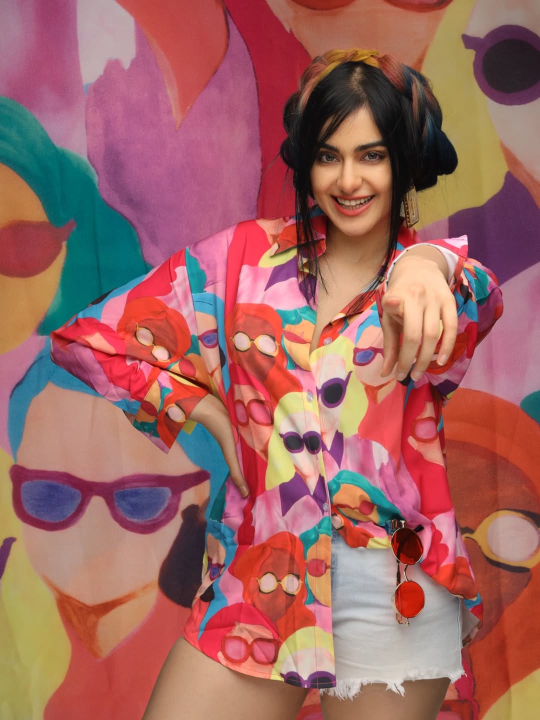 Adah Sharma’s vibrant, sunglasses-in-hand energy shows us that great style is simply fearless prints, fearless attitude, and a side of playful swagger