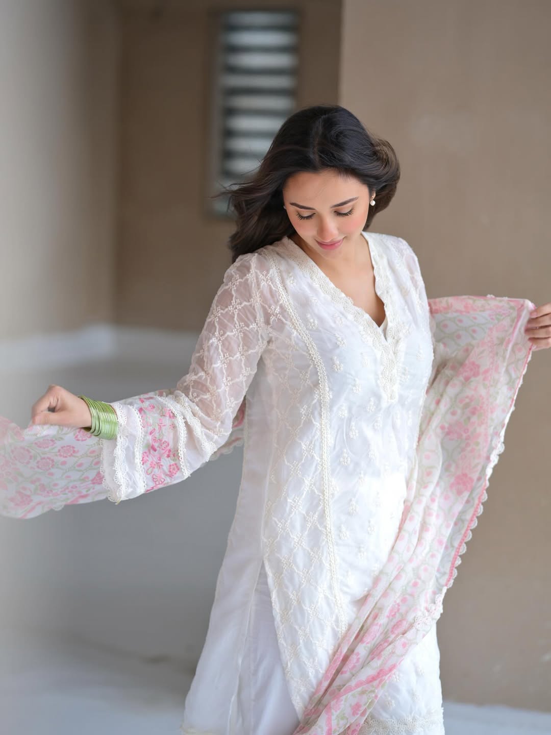 Akanksha Sharma turns elegance into an art form–poised in white, radiating grace with a playful twist