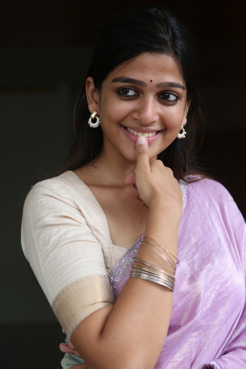 Ananthika Sanilkumar blends grace with a hint of playful mischief–dressed to dazzle and clearly ready to own every camera angle