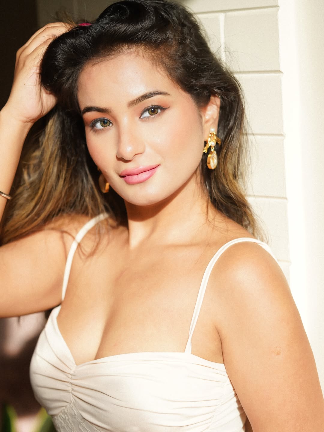 Anila Kharbanda making that white dress work overtime-serving elegance, sass, and a silent reminder that crowns are optional when you're already the queen