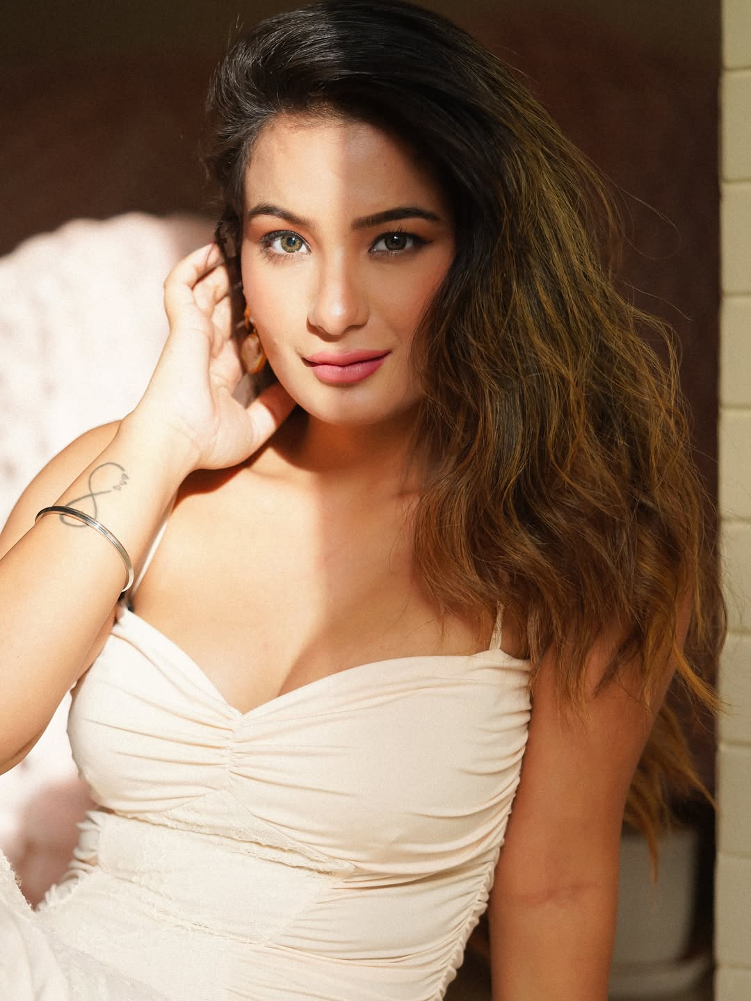 Bad hair day? Not for Anila. Just a wild mane, a wild dress, and wildly stealing the spotlight-fashion chaos never looked so good