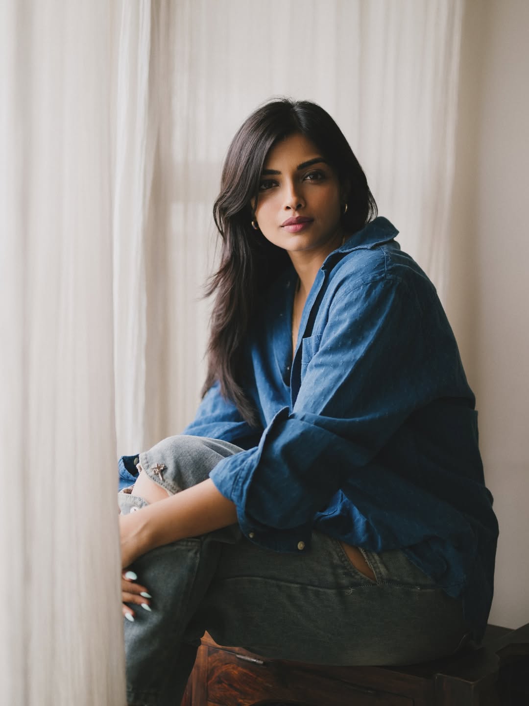 With poised charm and casual flair, Ashna Zaveri radiates style in a relaxed denim ensemble
