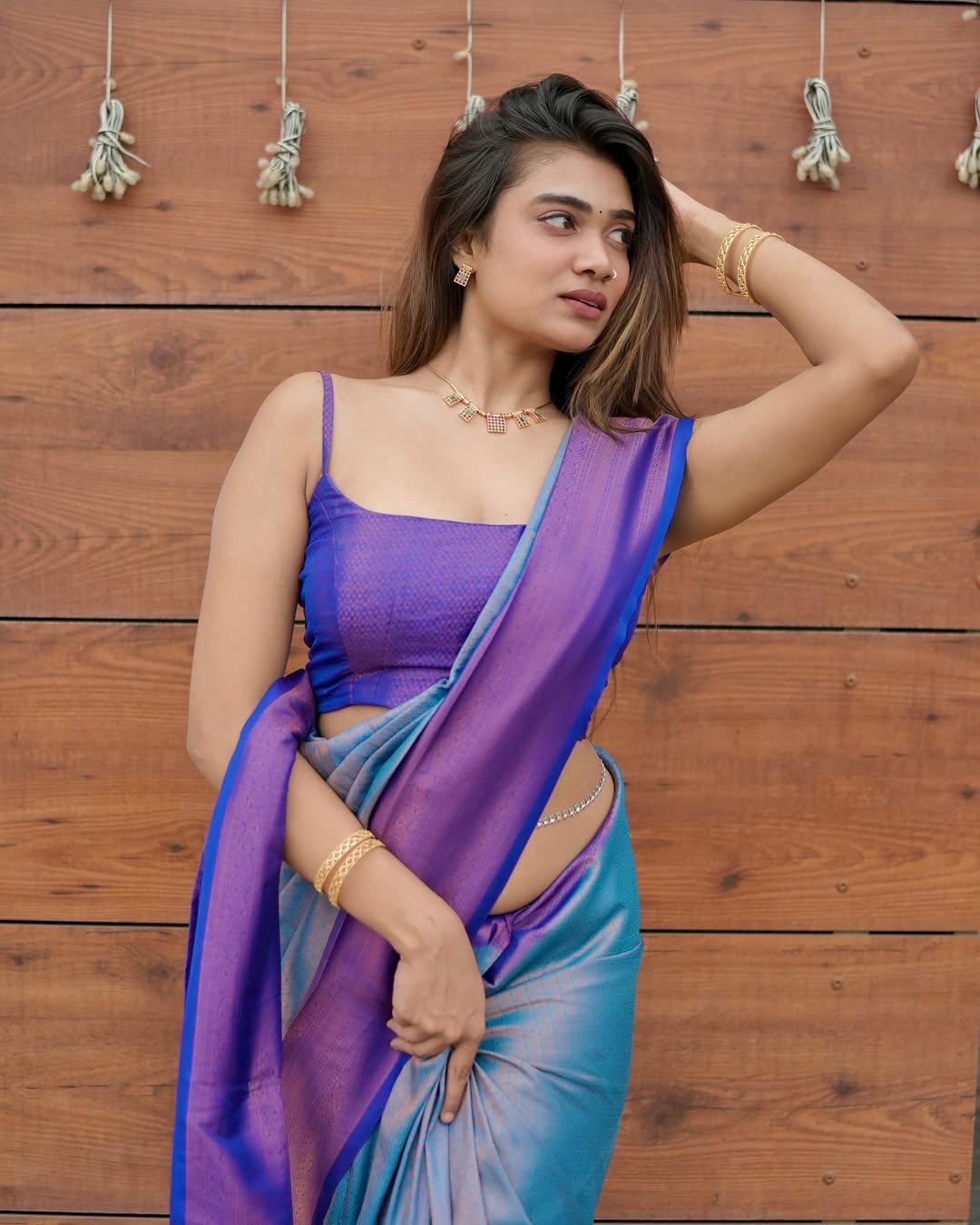 Devananda’s saree isn’t just purple-it’s the official colour of confidence, sass, and zero-effort fabulousness