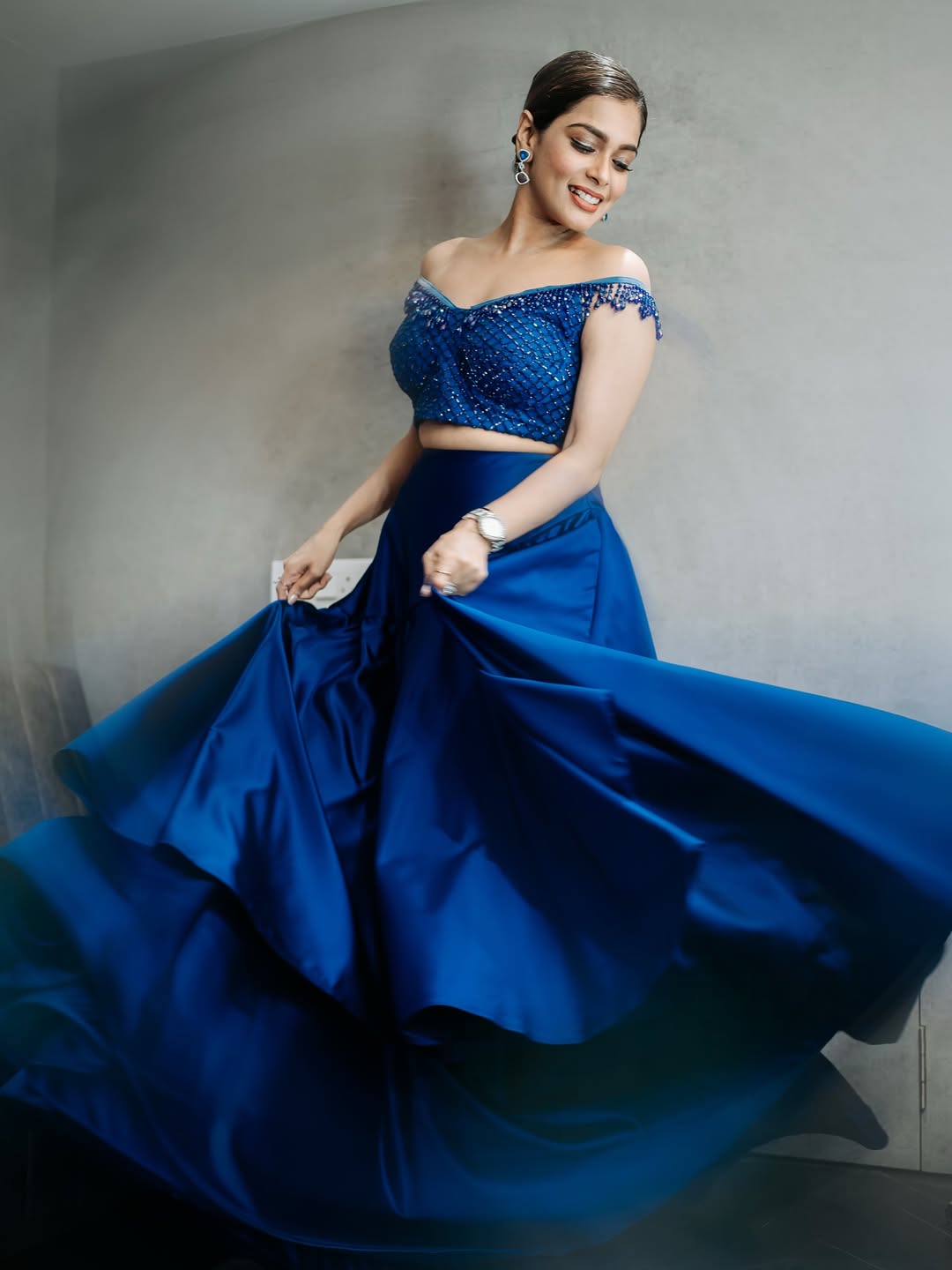 Kiki Vijay in full glam mode-twirling like a fashion hurricane in royal blue, and leaving no spotlight unclaimed