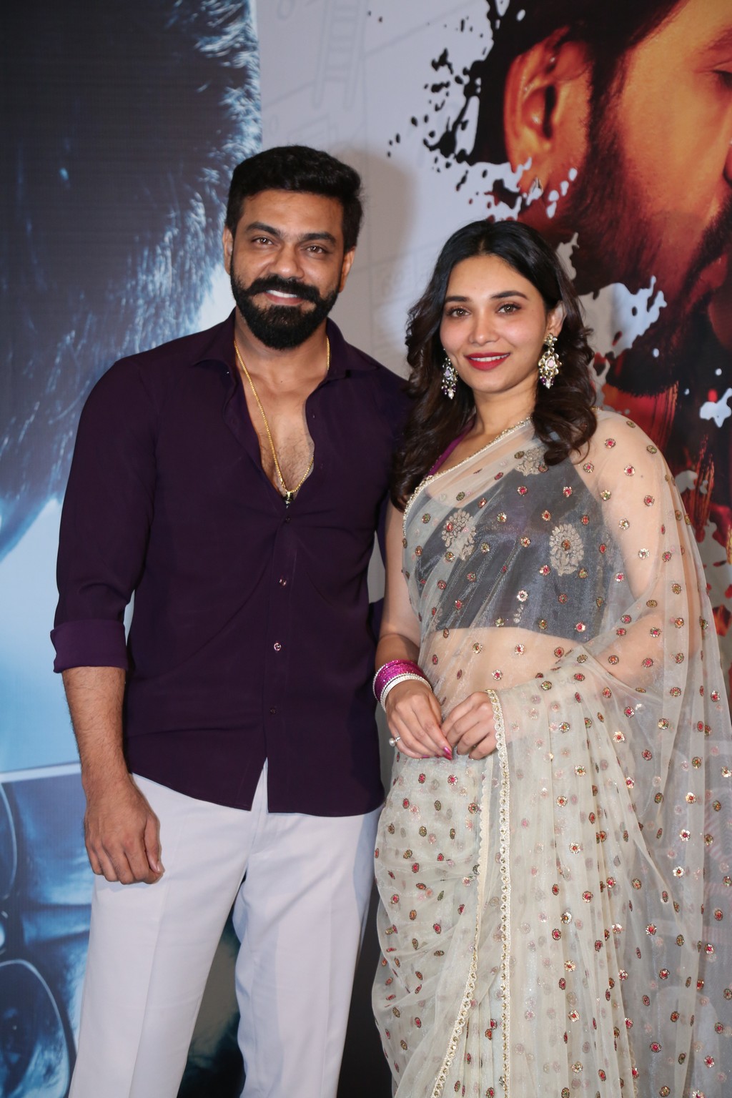 Arjun Ambati and Jenifer Emmanuel posed together for the cameras during the press event, exuding charm and confidence