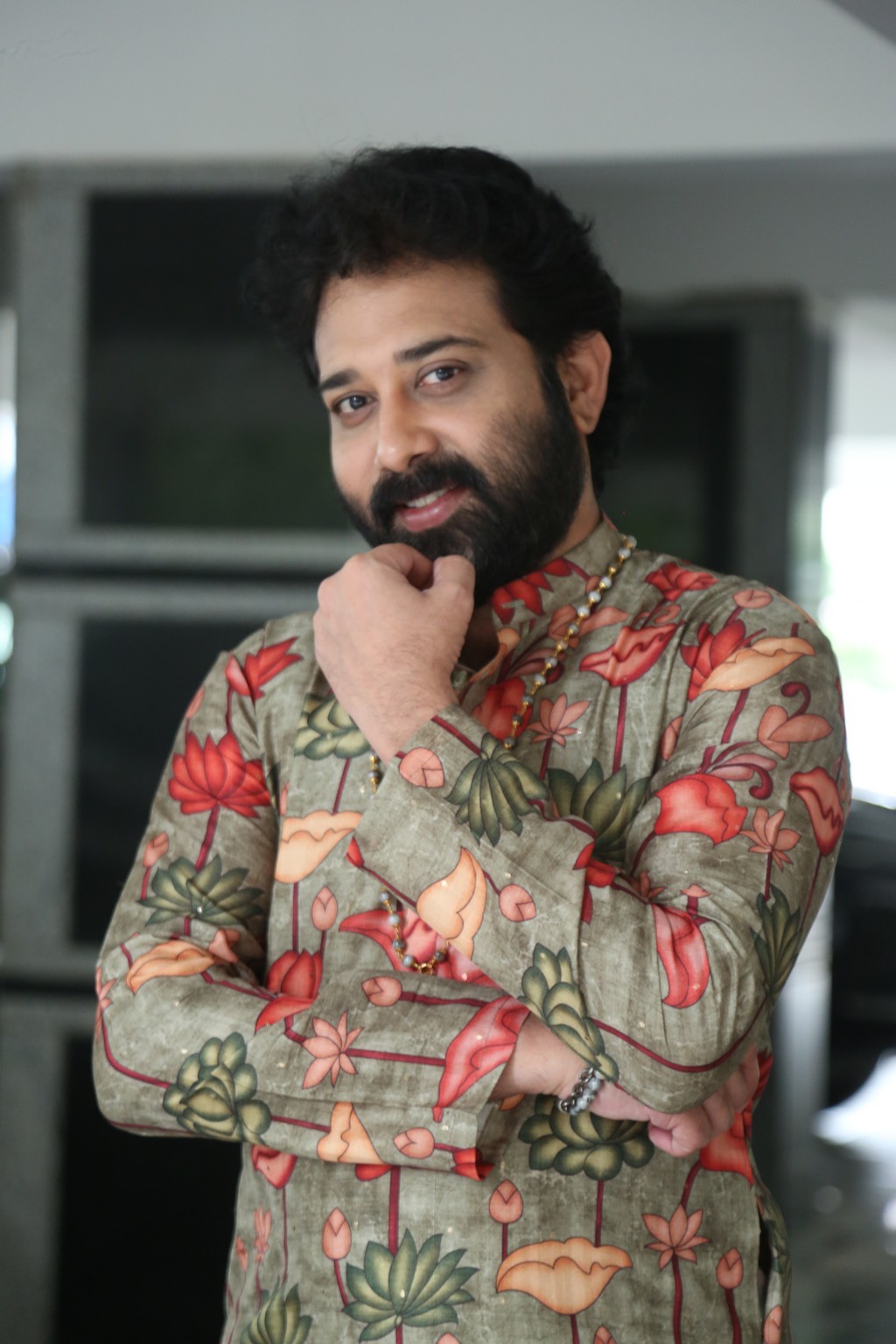 Bringing a burst of color and charisma, Siva Balaji makes flower power look fiercely fashionable and undeniably fun