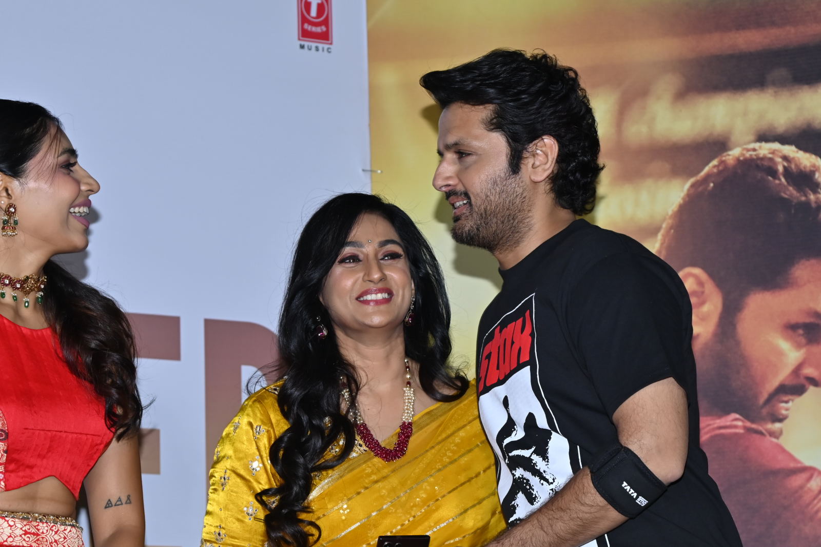 Actor Nithiin, Laya Glam, and Sapthami Gowda were spotted engaging in friendly banter, exchanging smiles and laughter off stage