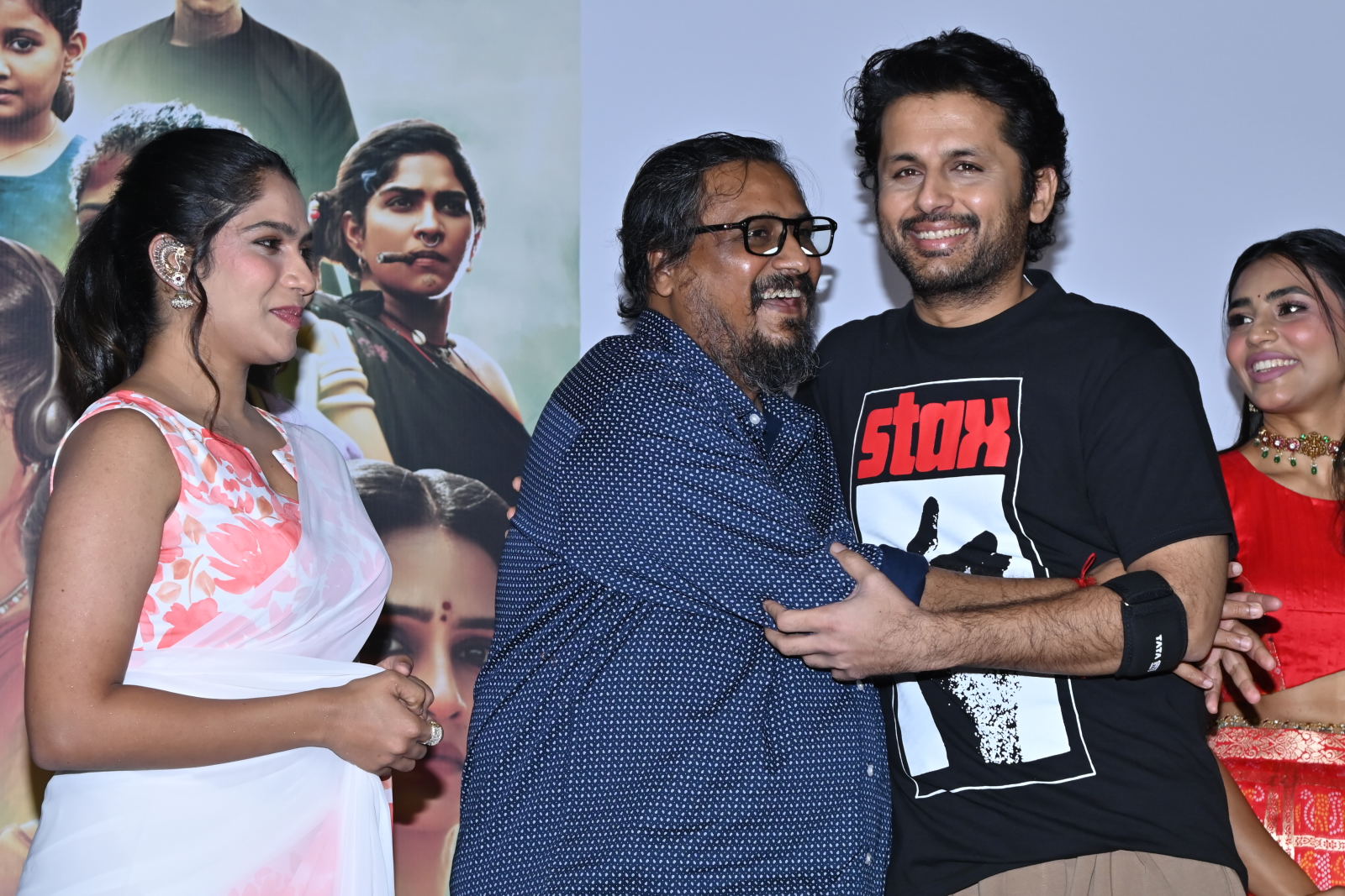 Actress Swasika Vijay and director Venu Sriram shared a warm hug with Nithiin, showcasing their camaraderie and excitement for the film