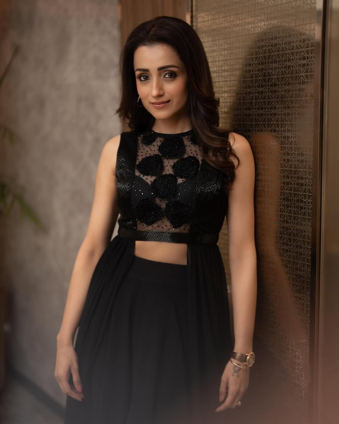 Trisha Krishnan in black with florals-serving elegance and drama like your favorite soap opera, but with better lighting and no commercials