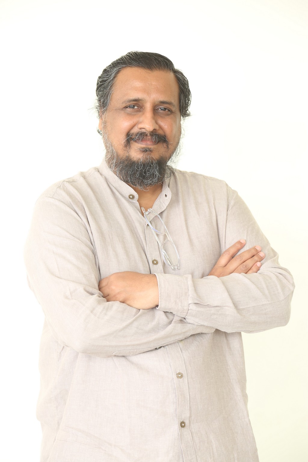 In his understated beige kurta, Venu Sriram flashes a smile that says, “Who needs a runway? The world’s already my set.”