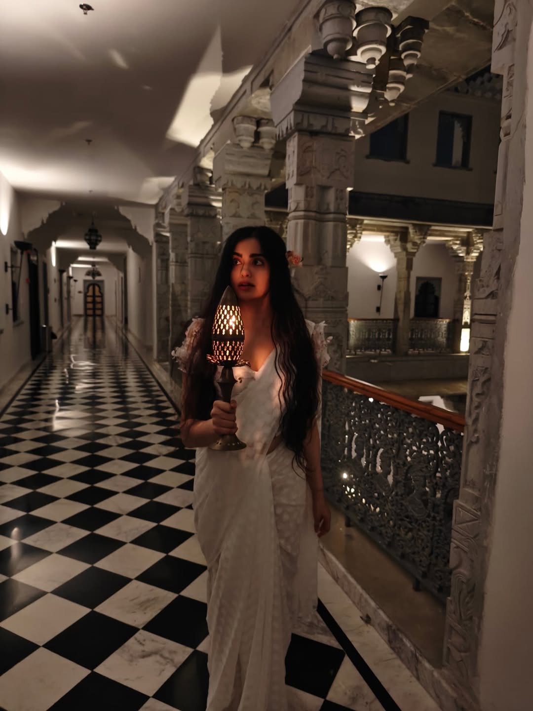 Adah Sharma in a sleek, traditional sari, lighting up the hallway with elegance–and maybe a little mischief–proving that classic style and a hint of mystery never go out of fashion!