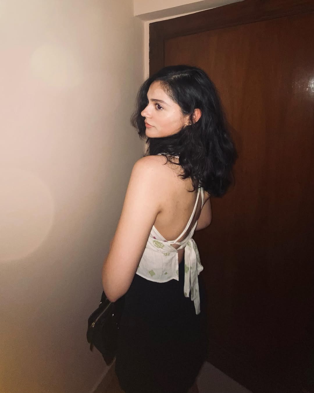 Aneet Padda proves that effortless elegance with a side of playful mystery is the ultimate style statement–who knew looking this good could be such a fun secret?