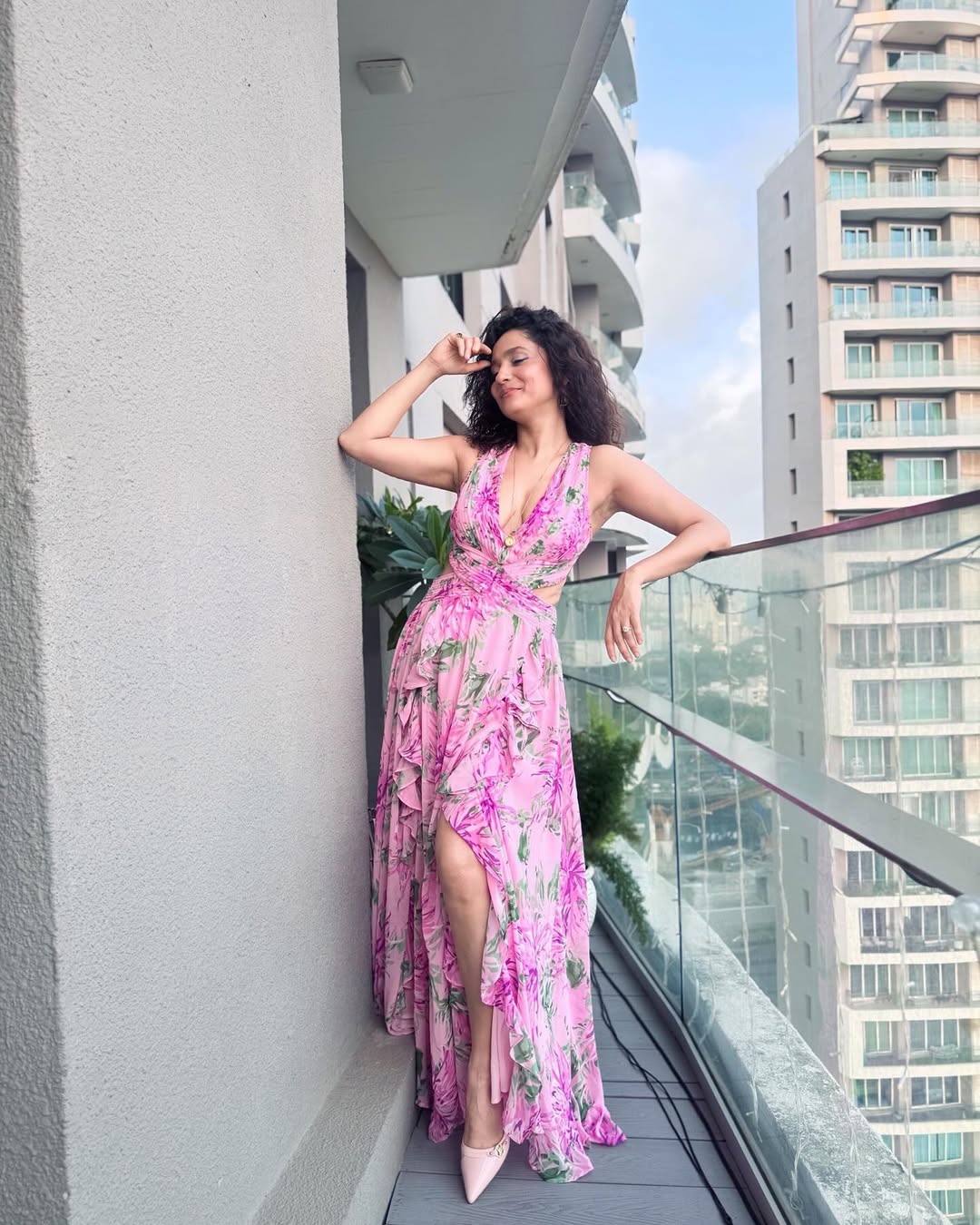 Ankita Lokhande effortlessly blending high fashion with city chic–proof that a floral dress and a confident pose are the perfect accessories for any balcony runway!
