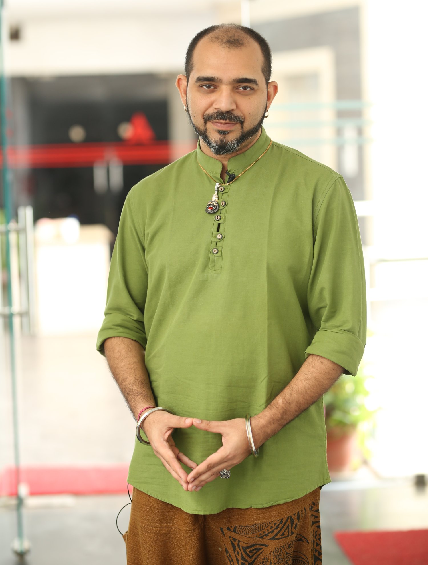 Ashwin Kumar: Mastering the art of traditional charm with a dash of modern swagger–green is not just a color, it’s a statement!