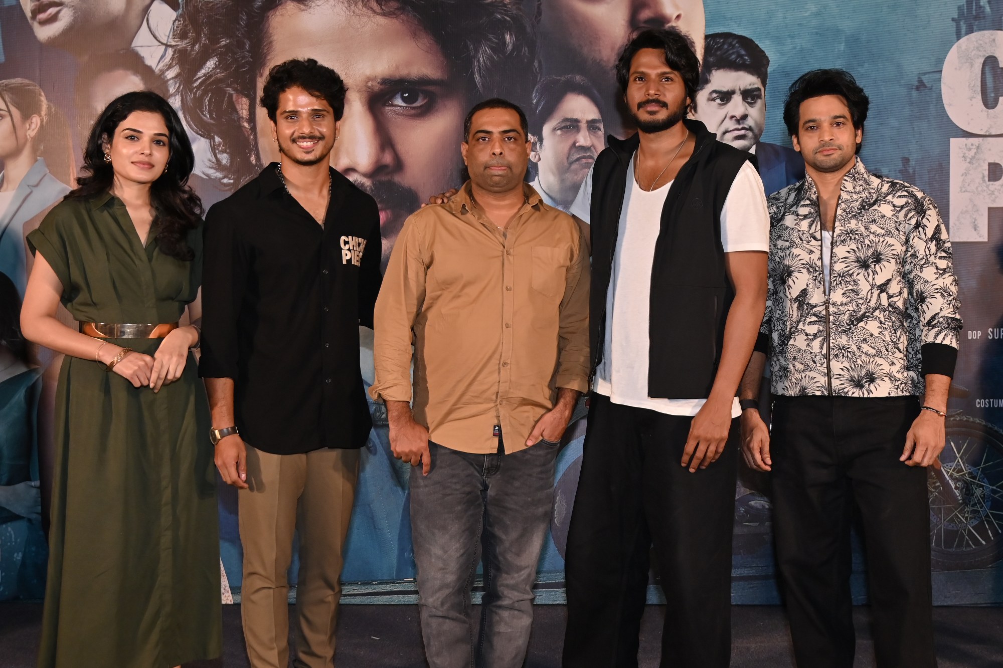 A dynamic frame featuring Harshitha, Nihal Kodhaty, Viswanadha Reddy, Sundeep Kishan, and Surya Srinivas was captured during the press meet photoshoot.