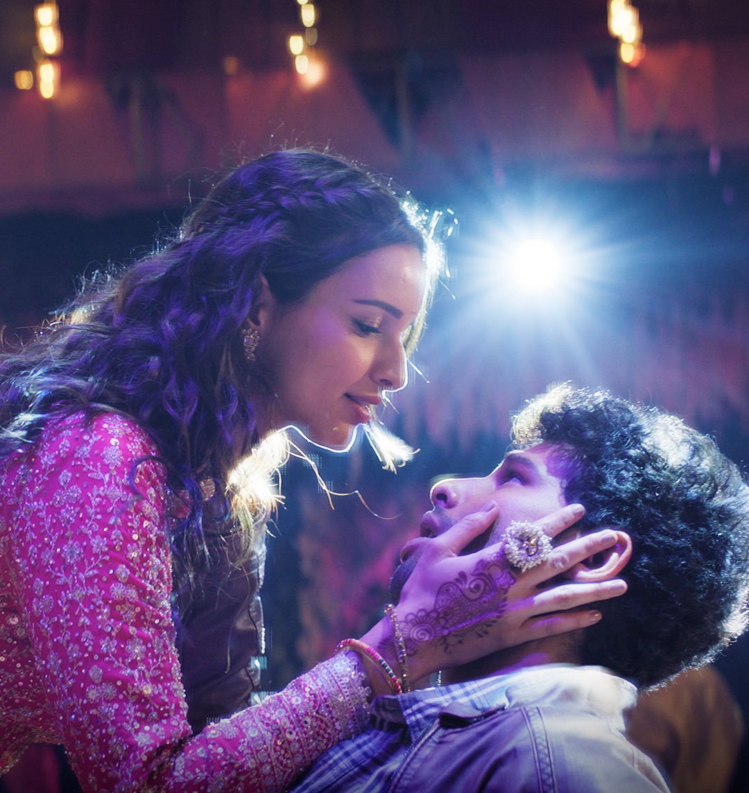 Triptii Dimri and Siddhant Chaturvedi light up the screen in a vibrant dance still from Dhadak 2.