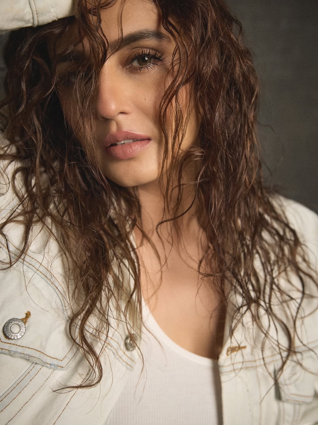 Huma Qureshi rocking her signature tousled waves and a confident gaze–proof that her style is as bold and captivating as her talent, with just a touch of playful sass!